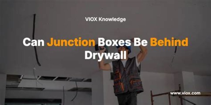 Can junction boxes be behind drywall?