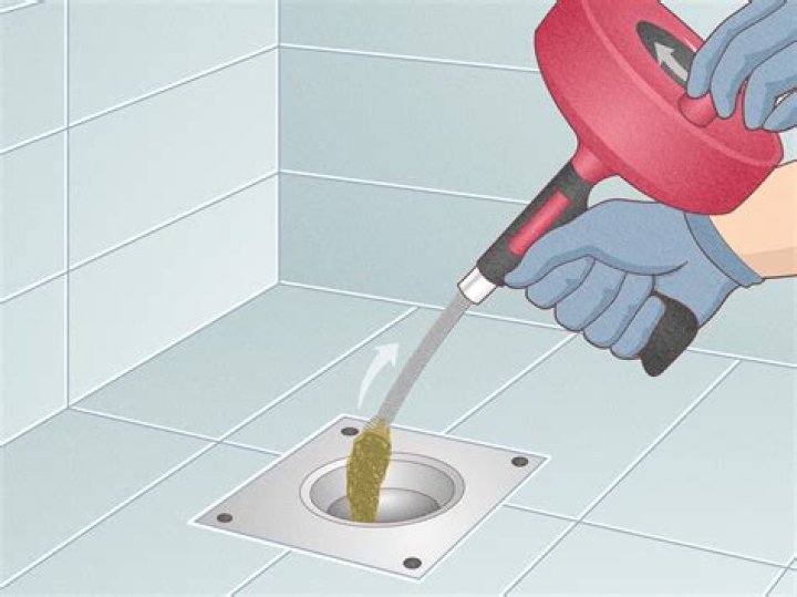 How do you clear a clogged Snake Drain?