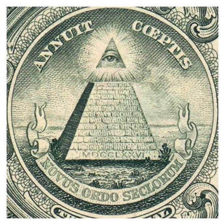 What does the Latin on the dollar bill mean?
